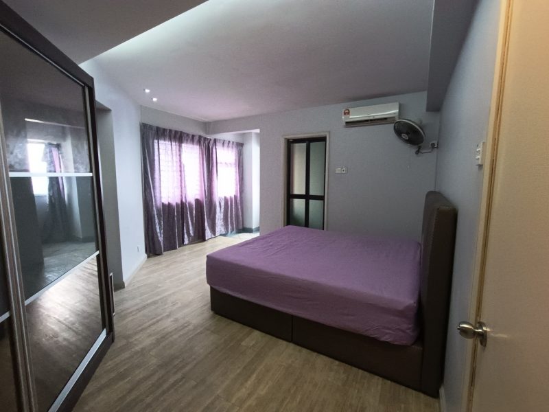 Master bedroom with private bathroom at Pantai Panorama Condominium